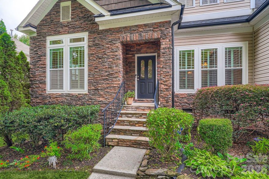 Step into style and sophistication with this beautifully upgraded 4-bedroom, 3 full bath residence, where every detail has been thoughtfully curated for comfort and convenience. The gourmet kitchen features sleek stainless steel appliances, an induction stovetop, and a brand-new microwave—all set against the warm backdrop of distressed hickory floors installed in 2018 with an open floorplan including crown molding and plantation shutters.  Smart home enthusiasts will love the integrated Google light controls and Nest thermostat, offering seamless automation throughout. The luxurious master bedroom located on the main floor offers trey ceilings , large walk-in closets, and ceiling fans. The upgraded master bathroom is a true retreat, boasting a walk-in shower, double floating vanities, and a Bluetooth-enabled shower speaker for a spa-like experience. Upstairs, discover a spacious bonus/flex room complete with a full upgraded bath—perfect for guests, a home office, or entertainment space.  Step outside to enjoy the two-level covered canopy deck, ideal for year-round entertaining, complete with a private hot tub. The professionally landscaped yard includes inground sprinklers for easy maintenance.    Additional upgrades include: Home warranty, pest control contract,
new hot water heater and water softener,
Tesla charger for eco-conscious living,
enhanced gutters and a recently upgraded roof.
This home is only minutes  from Lake Wylie and blends modern amenities with timeless charm—don’t miss your chance to make it yours!