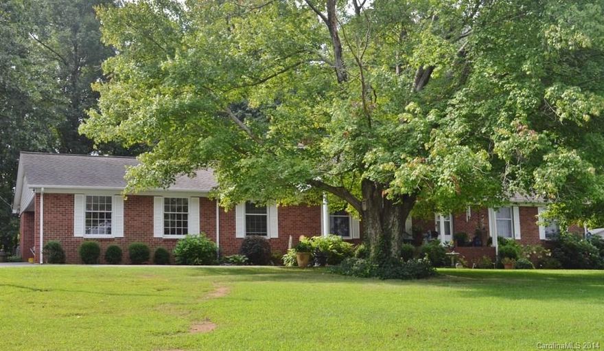 COUNTRY LIVING but close to stores, schools, Denver businesses! LRGE,ROCKING CHAIR FRONT PORCH, HRDW FLRS THRUOUT EXCEPT KIT ,BATHROOMS. LIVING ROOM W/ WOOD STOVE  FIREPLACE, GREAT ROOM W/GAS LOG FIREPLACE. 4 NICE SIZED BDRMS.CARPORT W/WORKSHOP ,16 X 12  STORAGE BLDG W/ POWER.KITCHEN W/LOTS OF CABINETS,NEW SMOOTH TOP RANGE,DISHWASHER SUNROOM OVERLOOKS FENCED TREED BKYARD. RV PAD W/POWER HOOK UP.4 ADDITIONAL PARKING SPACES.40 YEAR ROOF,NEW HVAC & DUCTWORK.RENOVATED PLUMBING.USDA, NO MONEY DOWN.