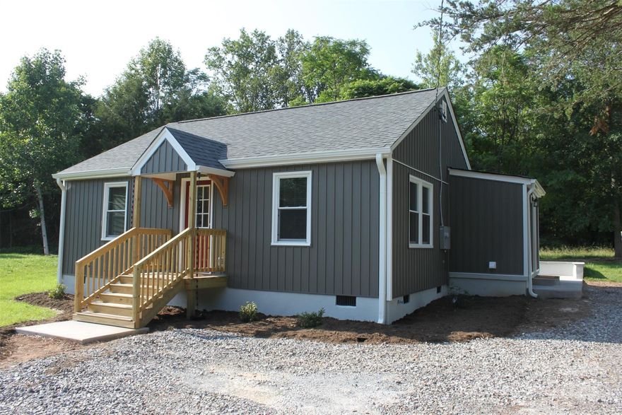 Charming fully updated 2 BR 1 Bath Bungalow. New roof; Siding; Electrical wiring and LED light fixtures; Insulation; Heat pump; Plumbing, Sinks and Faucets;....All Permitted, Inspected and Approved. New Cabinets; Luxury vinyl plank in kitchen and bath; Refinished hardwood floors in living room and bedrooms.  New Appliances include:  Refrigerator, Range, Dishwasher, Over Range Microwave, Washer and Dryer. Great location off of Hwy 21 in Jonesville, convenient to shopping; restaurants and Medical Care in Elkin, Yadkinville, Statesville and Winston Salem......in the heart of the Yadkin Valley Wine Region. Book your showing now...will not last long.