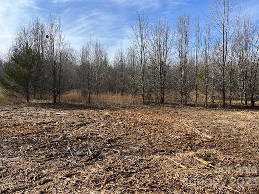 Here is your chance to own a beautiful flat 6.24 acre building lot that is convenient to just about anywhere. Wether you want a small farm or just a spot to build your dream home that's close to everything stop right here you have found it. This one won't last long. Call or text me today.