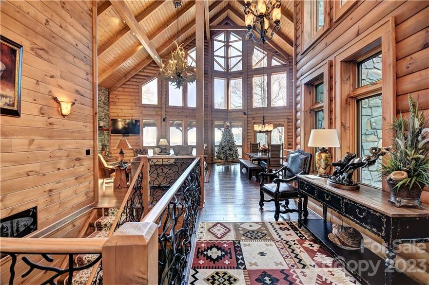 Elegant, Luxury Log home in the gated Smoky Mountain Retreat at Eagles Nest. Home is centrally located to many area attractions i.e. Cherokee Casino, Cataloochee Ski area, Dollywood, Smoky Mountain National Park, Blue Ridge Parkway. Asheville, Biltmore House, Hiking, fishing, rafting, photographers Dream, and much more. Large window with stunning long range views including a view of Lake Junaluska. Home includes Luxury bedroom, elevator, 1100 bottle wine cellar, generator, 3 stone fireplaces, 2 car garage with large parking area. all beautiful furnishings throughout the house to stay with the house minus owners personal items. Beautiful water feature just to the right of the Mahogany entrance door and beautiful Porte-cochere. The roads are paved and the dues pay for excellent maintenance of the roads summer and winter.  Smoky Mountain retreat does allow vacation rentals, however, all vacations rentals in Smoky Mountain retreat must go through Smoky Mountain retreat at Eagles Nest