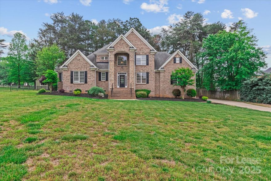 Stunning custom home on a spacious 0.64-acre wooded lot, packed with high-end upgrades and elegant finishes. This open floorplan features beautiful hardwood floors, oversized rooms, and a gourmet kitchen with imported Italian cabinets, granite countertops, and stainless steel appliances. Detailed moldings, tile baths, and an irrigation system add style and function throughout. Enjoy the serenity of the large, private backyard—perfect for entertaining or relaxing in nature. A two-car garage completes this move-in-ready gem. Luxury, space, and craftsmanship all in one exceptional home!  Residents benefit from a $55/month Benefits Package, which includes perks like liability insurance, credit-building support, identity theft protection, and more.