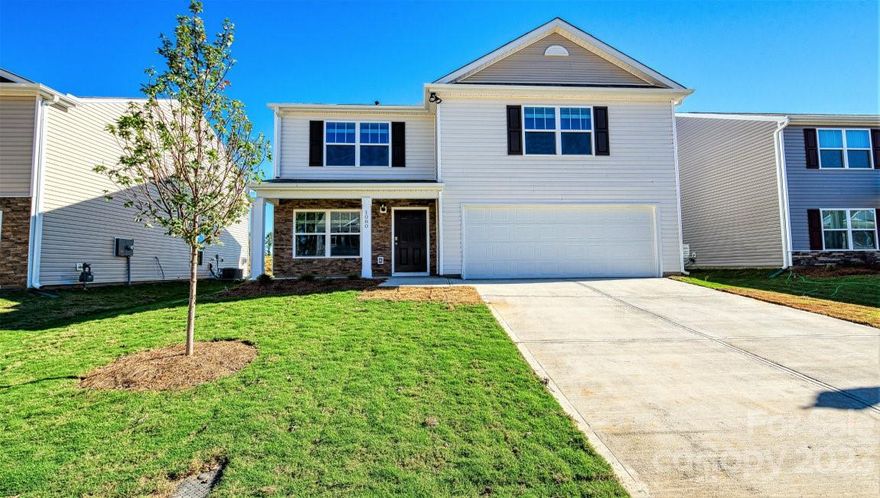 Beautiful, partial stone, 4 bedroom home situated only a few minutes to the future community pool This open floor plan home is an incredible value with all the benefits of new construction and a 10 year warranty. Our Home is Connected Package includes programable thermostat, Z-wave door locks and wireless switch, touchscreen control device, automation platform, video doorbell, and Amazon devices; All the finishes one would expect in a new home such as Modern LED Flush Mount Maxim Lighting® Throughout Home, Garage Door Opener with Two Remotes, In the Kitchen: 30” Cabinets with Crown Molding and Satin Nickel Hardware, Granite 3 Cm. Countertops with 4 inch backsplash, Stainless Steel Undermount Sink with Moen® Chrome Faucet and Sprayer, Whirlpool® Stainless Steel Appliances Remarkable opportunity to own in the 1st phase of a premier Dallas, NC community. Homesite #98