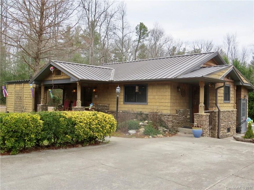 Character overflows!! this charming cottage conveniently located off Greenville Hwy. inside city limits! Cathedral ceiling, granite counters and attractive cabinets, wood floors and beautiful wood trim and doors. Lots of storage space inside, and nice level lot could have garden space. Lovely water feature, and pergola covered rock patio. Come see to appreciate!!