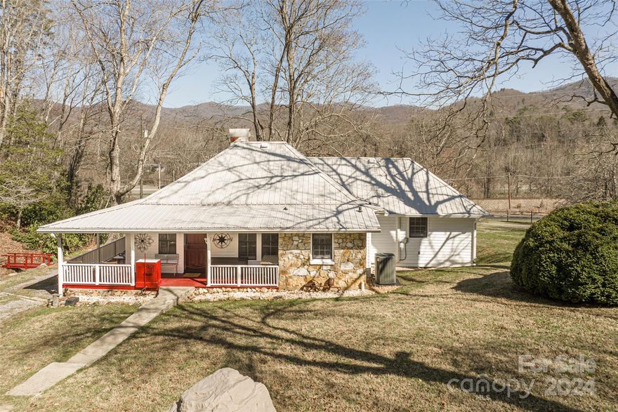 MAKE YOUR MOUNTAIN MEMORIES on 56 ACRES w/a Successful Airbnb ONLY 2 MILES FROM TOWN. 15 MIN TO ASHEVILLE & BILTMORE.   WATCH FLY-OVER VIDEO:   https://www.youtube.com/watch?v=dV3--iE955E 

Remodeled Farmhouse w/2 BARNS, a POND, DOCK, a CREEK, FIRE-PIT, Several Cleared ACRES- PASTORAL Setting. Creek runs through the property & Multiple Springs. Trees on Prop: Pecans, Chestnuts, Apples, 4 Species of Oaks, Maples, Hickory, Sweetgum, Poplars. Easily Walk-able TRAILS or use ATV to Access property and Ridges with Potential Endless Views! With ROAD in place, Electric, Water & Natural Gas ALREADY ON SITE, Could QUICKLY be Developed into MULTIPLE HOME SITES, Vacation Rentals or a Stunning Private Estate. 
700 Ft of Road Front- State Maintained! Property Currently in Land Conservation Program - LOW Taxes! 
Can Easily be Removed if desired. TOTAL REMODEL: New HVAC, Granite Kitchen, Gas Fireplace, Water Heater, 3 bed Septic, & Much More. Ask for FULL LIST of UPGRADES.  *1 Yr. HOME WARRANTY*