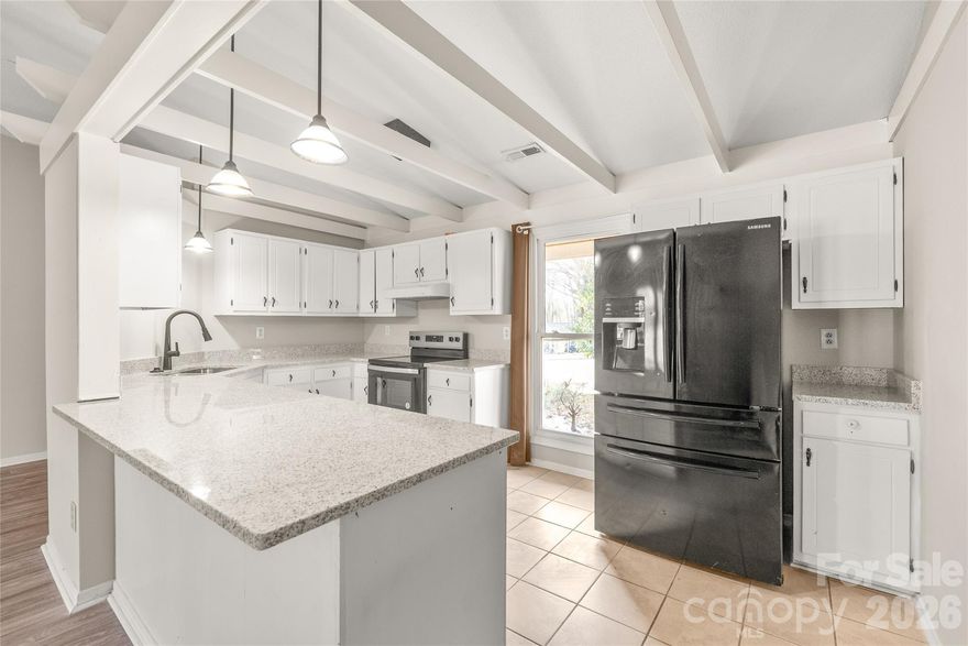 Beautiful NEW GRANITE COUNTERTOPS-KITCHEN SINK-FAUCETT, STOVE, GARBAGE DISPOSAL,  and an open floor plan to enjoy an Oversized Great Room, Large Utility room, with large spacious backyard for your pets, gatherings.  The 1 car garage is so useful for those that want the security of walking right into the kitchen area from their garage.  More recent updates are in the lighting, baths, paint and beautiful floors.  Plenty of cabinetry in the kitchen overlooking the Great room with a corner Fireplace.  Home has been pre-inspected and the inspection is available to buyer(s).   Owners have never lived in the home.