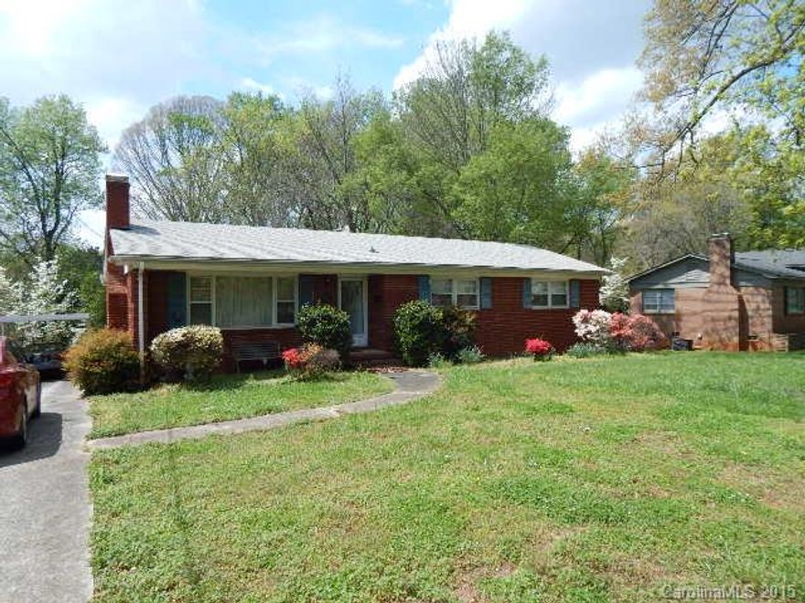 LOVELY BRICK HOME SITUATED ON LARGE LOT.  WOOD FLOORS IN LIVING ROOM.  THIS GEM IN THE ROUGH COULD BE A BEAUTIFUL HOME WITH THE RIGHT OWNER.