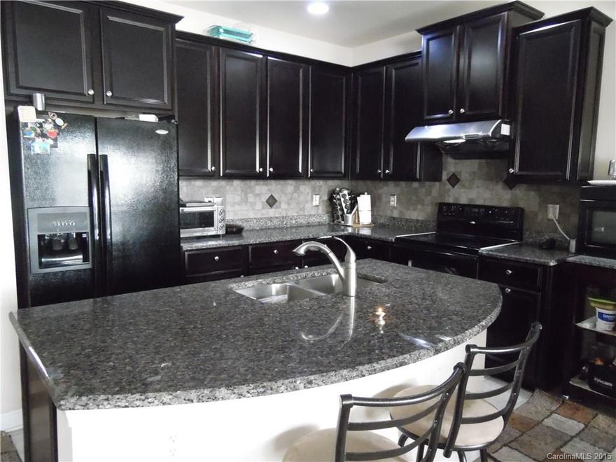 1 Year Home Warranty- Stunning kitchen with large granite island, upgraded raised countertops in Bathrooms, Large Master Bedroom, Great location near the Lake and close to shopping, garden tub. fenced backyard for privacy.