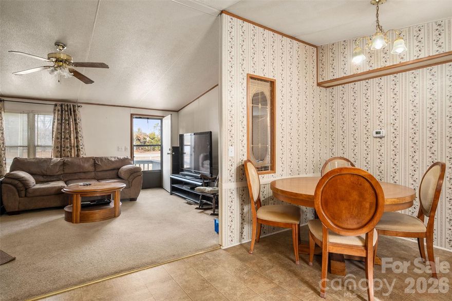 Well-maintained 3BR/2BA manufactured home that’s move-in ready! This home features a comfortable open floor plan, spacious primary bedroom with private full bath, and two additional bedrooms for family, guests, or office space. Clean, bright, and consistently cared for over the years. Vapor barrier installed last year, roof  2018.  A great option for affordable, low-maintenance living. Schedule your showing today!