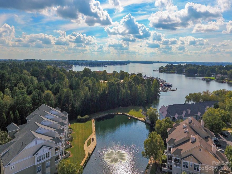 PRICE IMPROVEMENT -Tranquil Water View At The Lake! Wonderful Amenities such as Outdoor Pool,Tennis Courts, Pickleball,walking path, kayak storage  & access to Lake!
  This  Sought After 1st Floor Condo (no Steps)  has Stunning Features that make this Condo "So Special."
From its 9 ft Ceilings w/ Crown Molding & Ceiling fans to its Open Floor  Concept to its Water views  
  Light Hardwoods thru out Great Room & Master Suite & Foyer -Ceramic Tile in Both Bathrooms & Kitchen
Mas Bathroom has Nice  5'Ft  Shower w/ elongated Vanity Sink & Large Walk in Closet. New Laminate Wood 
plank floor in Guest Bedroom/office /flex room & Full Guest Bathroom 
Designer Kitchen with  Creamy 42" Cabinets  w/Dark Brown Trim Outlined with Marble Granite Counters plus Bar
. Stainless Steel appliances -Decorate Door hides a Separate Pantry & Laundry Room off Kitchen The Extended Concrete Deck is great for Relaxing or enteretaining friends & family.  
 Ideal Location Close to  restaurants & shopping