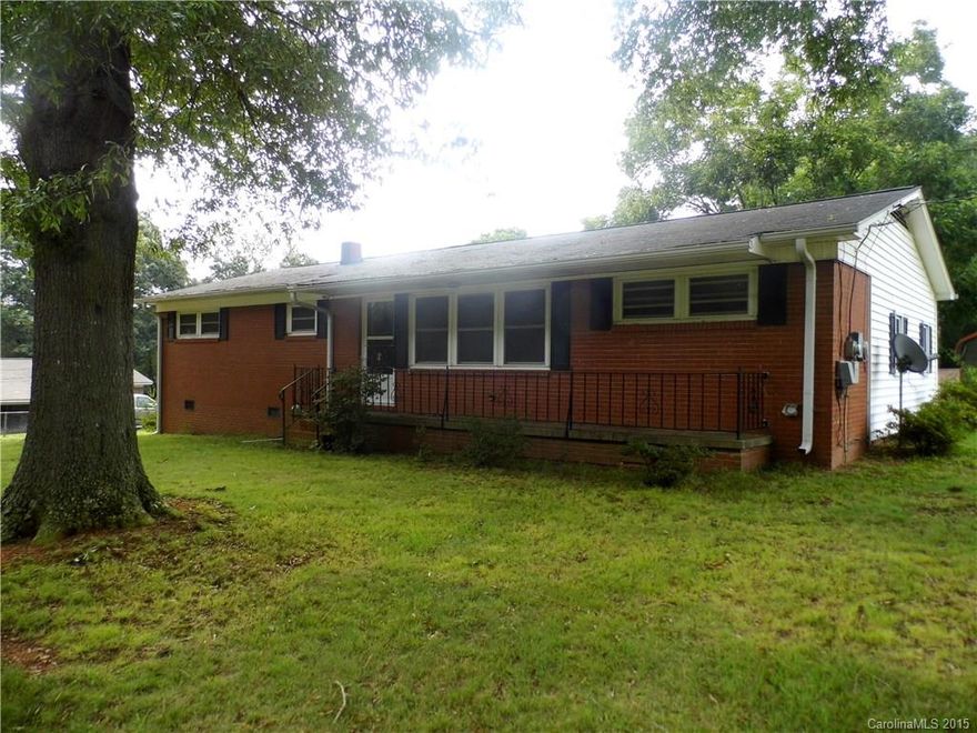 Just reduced! New listing within walking distance of Stanfield Elementary school. This solid home has a new roof put on three years ago and new carpet was just put down in some of the rooms.  The home needs some updating but is very livable.  Chain link fence and gate are in place and there are THREE small sheds/outbuildings for storage. Buyers will be thrilled to find a solid home in this area for such a good price.