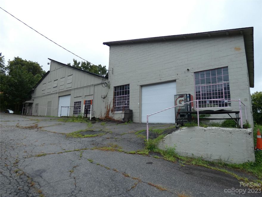Old foundry building in Statesville, NC. Previous rail siding exists- potential buyers would need to consult Southern Railway to see if it could be activated.  Office space includes 2 small offices in warehouse and 870 sq. ft. mezzanine. Seller makes no representation with regard to gas heaters in building.