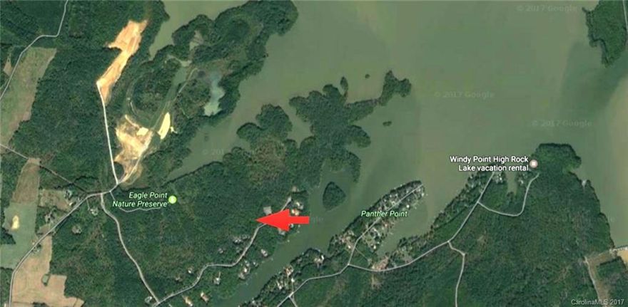 1.91ac on Emerald Bay Dr, Beautiful Homesite in Gated Water Front Community. Community offers boat ramp, daily use boat slips, secured boat/RV storage & backs up directly to the Eagle Point Nature Preserve w/3 miles of walking trails. This protected area means no one can build behind you except the Bald Eagles & other beautiful wildlife. This community is located on the 2nd Largest Lake in NC, High Rock Lake. Enjoy boating, fishing & skiing or take a sunset cruse to one of the many restaurants.