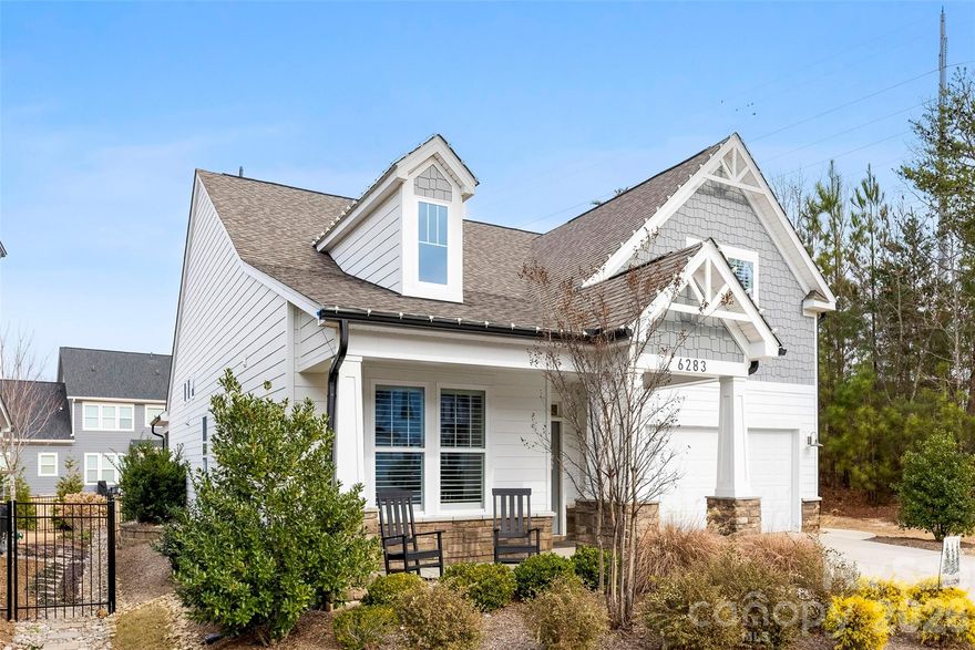 Missed it the first time? It’s back!
Discover this exceptional ranch-style home located at the end of a quiet cul-de-sac in highly sought-after Masons Bend in Fort Mill.  Surrounded by a serene wooded area, this residence offers rare privacy and a beautifully elevated living experience. Step inside to soaring 18-foot ceilings that create an impressive sense of space and natural light throughout the main living areas. The thoughtful floor plan features three bedrooms on the main level, providing effortless, functional living for all lifestyles. Upstairs, a private guest suite with full bathroom, and multipurpose room, offers the perfect retreat for visitors, an older child, or a dedicated home office. This home combines luxury finishes, architectural interest, and a prime setting—an outstanding opportunity. Agent is Owner
Ask about special lender incentives.