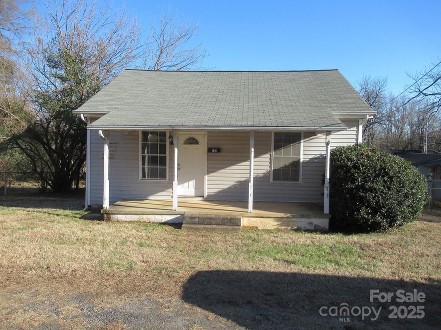 This cozy 2-bedroom, 1-bath home on the west side of Bessemer City offers a prime investment opportunity with potential equity gain. Conveniently located for commuting to Charlotte and Shelby, it features a roomy den accessible from the covered front porch and a spacious kitchen with dining space. The lot has a gentle slope away from the street, a fenced rear yard, and a covered front porch ideal for relaxing. While the home needs some TLC, it presents a solid opportunity for buyers considering Conventional Financing or Cash Offers.