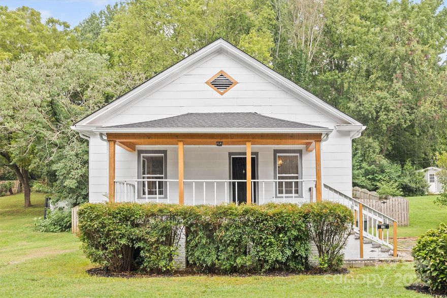 Charming updated bungalow just minutes from thriving downtown Rock Hill! Tucked away at the end of quiet Montford Ave. Fully renovated but still loaded with all of the character of an older home. Hardwood floors in living room and both bedrooms, and LVP in kitchen. Kitchen with gas range and granite counter tops. Updated bathroom with custom tile surround at tub. Spacious front porch is perfect for rocking chairs. New roof in 2020 and new HVAC in 2020. Low maintenance vinyl windows. Attic pull down stairs allow you take advantage of storage above! The large backyard is completely fenced with a 6 ft privacy fence and features a paver patio, which makes a great spot to entertain! Property is in FEMA Flood Plain and seller has an transferrable flood policy. Seller has never had any issues with flooding. Agent can provide survey and insurance info upon request.