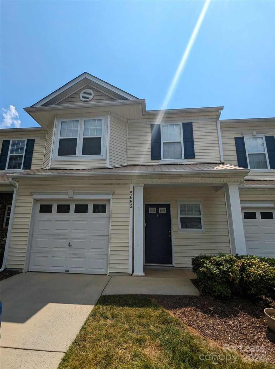 Pretty 2 bedroom, 2.5 bathroom townhome in Indian Land, just 10 minutes from Fort Mill and Ballantyne! First floor has kitchen with breakfast bar, family room and dining area have LOTS of natural light from big windows along back wall, opening onto back patio enclosed by privacy fence with storage closet. Gate from patio opens out into large common open space with trees and grass. Family room also has gas fireplace. Second floor has 2 primary suites with garden tubs, vaulted ceilings, and walk-in closets! Loft and laundry closet with washer/dryer hookups also located on second floor. Community has large club house, pool, and beach volleyball area.