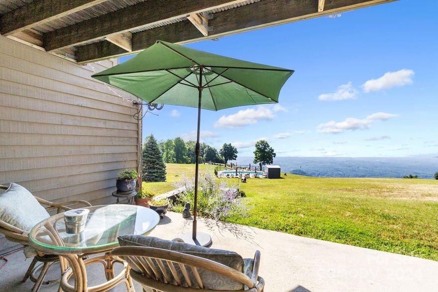 Don’t Miss this Rare Opportunity to live in a Mountain Top Paradise! Condo w/all the conveniences of One-Level Living! Enjoy amazing panoramic long range views from the top of White Oak Mountain. Enjoy your coffee on the expansive terrace while taking in a stunning sunrise. Step inside to find a beautifully designed open floor plan, living room w/wood burning fireplace and new sliding doors that flood the space w/natural light, charming dining area & a well equipped kitchen featuring new stove, & bright backsplash. The primary bedroom is a relaxing retreat that opens to spacious terrace! Energy Efficient: This condo has been updated w/ energy-efficient windows. Amenities: swimming pool, gazebo and tennis/pickleball courts!  Situated on sought-after White Oak Mountain, you’re just a short drive away from charming local shops, dining, FENCE, theatre & hiking/biking trails. Schedule a private tour today and make this exquisite condo your new home! Make an offer today!