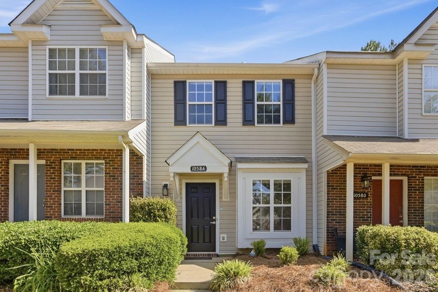 Welcome to Hunter Downs—where comfort, convenience, and thoughtful updates come together! This beautifully renovated 2-bedroom, 1.5-bath home is truly move-in ready and offers stylish upgrades throughout, including new LVP flooring, fresh paint, updated light fixtures, and new stainless steel kitchen appliances. The bright and functional open floor plan features a freshly painted kitchen with ample cabinet space, a sunny dining area, and a spacious great room perfect for everyday living or entertaining guests. A convenient half bath and laundry closet completes the main level. Upstairs, both generously sized bedrooms feature vaulted ceilings, creating an open and airy retreat with plenty of natural light. Step outside to enjoy the private fenced backyard and refreshed wooden rear porch. Major updates include a roof replacement in 2022, adding peace of mind for years to come. Residents of Hunter Downs enjoy fantastic community amenities including a neighborhood pool, oversized cabana, and sidewalks perfect for evening strolls or summer relaxation. Conveniently located just minutes from I-485, shopping, dining, UNCC, medical centers, and entertainment, this home offers exceptional value in a desirable Charlotte location. Whether you’re a first-time buyer, downsizing, or looking for low-maintenance living, this one checks all the boxes! HOA fee is $247/month through June 2026 and will increase to $253/month thereafter. The confirmed special assessment will be paid in full at closing. New rental restrictions begin January 2026 requiring owner occupancy for 5 years prior to leasing, with all leases requiring a minimum 1-year term. *The HOA covers trash, water, sewer, front yard maintenance, siding and shingles.