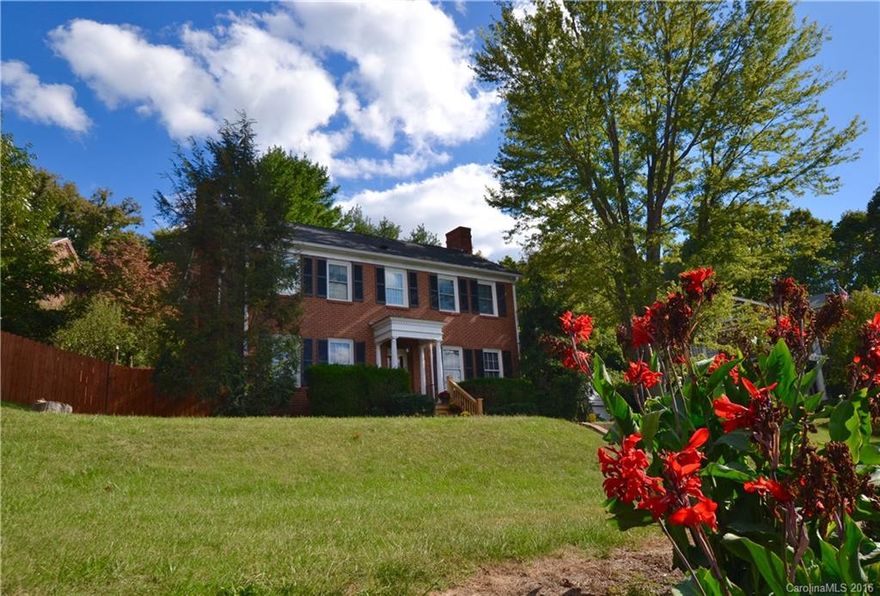 Charming brick Colonial in the heart of town near shops, restaurants, services. Built in 1940, home has many original features that highlight the period architecture. Step back in time as you enter the formal entrance way with stairs to your left leading to the upper floor. High ceilings and rich wood flooring add to the ambiance of this old beauty! Many upgrades make living comfortable year round. Owned by the original family it has been well maintained with up to date internet capabilities.