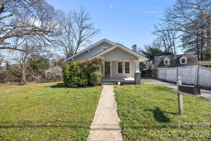 Located just minutes from downtown Statesville, this inviting home offers character, thoughtful updates, and excellent potential for homeowners and investors alike. The covered front porch provides a welcoming entry and a relaxing space to enjoy the neighborhood.

Inside, you'll find original hardwood floors, abundant natural light, and an inviting layout that flows easily between the living and dining areas. The kitchen features stainless steel appliances, ample cabinetry, and durable flooring designed for everyday living. The updated bathroom includes a spacious tiled walk-in shower with modern finishes. The two-bedroom layout offers comfortable living with flexibility for a guest room, home office, or personal space. Ideally situated near shopping, dining, and major highways, this property presents a great opportunity for first-time buyers, downsizers, or those looking to add a solid property to their investment portfolio.

Seller paid 2-10 Warranty included

Refrigerator, washer, and dryer to convey. Television and sectional negotiable with an acceptable offer.