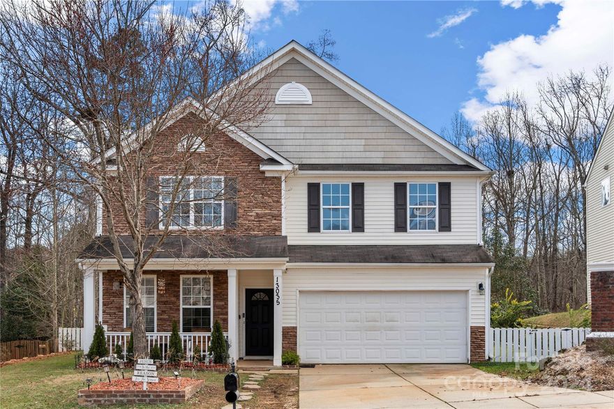 Discover the sleek modernity of Steel Creek with this pristine 4-bedroom home in the Coventry community, recently enhanced with a fresh coat of paint throughout. The entire home is adorned with durable LVP flooring, setting a welcoming tone from the moment you step inside. The living room, warm and inviting with its fireplace, flows into a  kitchen boasting a center island, cozy breakfast nook, and sophisticated granite countertops. Venture upstairs to find a multi-use loft, a spacious master suite equipped with in-bathroom speakers, and additional bedrooms ideal for family or guests. The exterior features a private deck and a verdant tree line for an oasis of privacy. Conveniently located near shopping, dining, and entertainment options, and merely minutes from Carowinds, Rivergate shopping center, Lake Wylie, and a quick 15-minute drive to Uptown Charlotte and the airport. Don't miss your chance to make this beautifully updated sanctuary your new home. Schedule a viewing today!