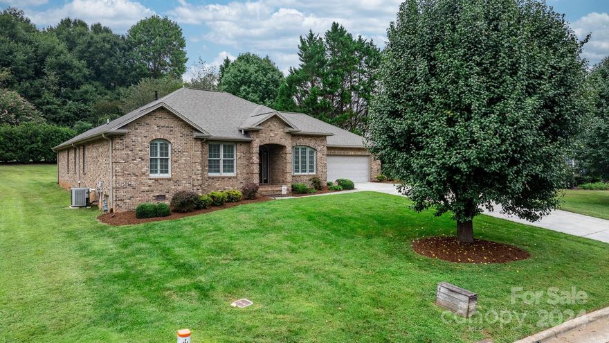 The home everyone says they are looking for. Approx. 2,000 sq. ft. on one floor plus a rear covered patio and a two car garage in one of Morganton's most desirable areas. Note that this brick home was built w/ updated architectural elements not commonly found in this area.  Step inside to a semi open concept space. Note the beautiful hardwood floors and the overall condition of the home. Wow! This area hosts a Living Room with a gas fireplace, a Kitchen, a Breakfast area and a dining room that could also work for an office. To the left is a wing that hosts two bedrooms and a bath. In the rear of this wing is a Primary Bedroom w/ a dream bathroom. Bring your groceries and supplies directly in from the two car garage that has two storage rooms convenient to load and unload your vehicle. Step out back to a covered porch overlooking the expansive back yard. Experience  a walkable community near Bethel Park, that is currently undergoing renovations, Interstate 40 and medical facilities.