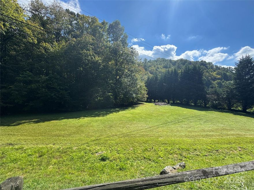 Close to I26 access, Hatley Pointe Resort, Wolf Laurel Resort and Mars Hill. These 10 acres is a portion of 9850-28-1582. Next door to 954 Puncheon Fork Road. Some flat area, stream and wooded area on one side of Puncheon Fork Road perfect for homesite and part of property across the street. The tax value is for all of PIN#9850-28-1582. Stream on property has minimal flood potential per NC FEMA maps. Property will need road into property off state maintained paved road. Close to skiing, tubing, whitewater rafting, Appalachian Trail. Very special location to enjoy full or part time living. Survey on file.