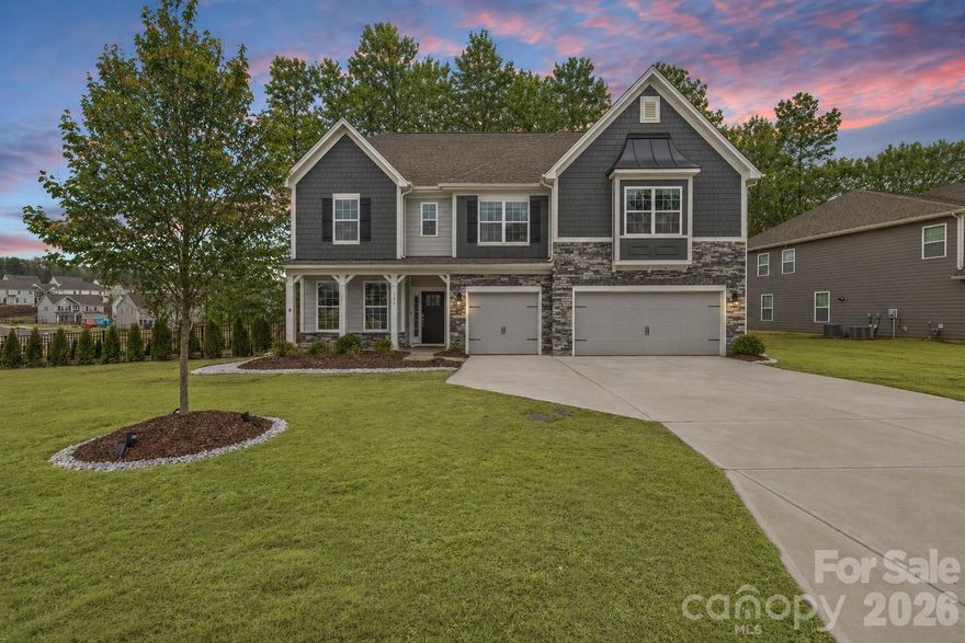 Welcome to 336 Streamwood Rd in Troutman - where peaceful living meets everyday convenience! Enjoy the Charm of Troutman while being just minutes from Mooresville, giving you quick access to shopping, dining, and Lake Norman living. Check out this stunning, upgraded, and truly better-than-new Jasmine floorplan, ideally positioned on a private premium 0.44-acre lot in the highly sought-after Enclave at Falls Cove. Only two years old and offering over 4,500 square feet of meticulously maintained living space, this expansive 5-bedroom, 4.5-bathroom residence perfectly combines luxury, functionality, and modern enhancements, creating a home that feels more like a custom build.

From the moment you arrive, the home makes a lasting impression with elegant curb appeal, professional landscaping, and extensive exterior improvements designed to enhance both privacy and outdoor living. Inside, soaring ceilings, wide-plank flooring, and a light neutral palette highlight the home’s open, flowing layout. No detail has been overlooked, with over $100,000 in carefully selected upgrades throughout.

The main level is thoughtfully designed for both everyday comfort and entertaining, featuring a private study with French doors, a generous dining area, mudroom/drop zone with built-ins, oversized living room with gas fireplace, and a desirable guest suite with a full bath. The gourmet kitchen serves as the centerpiece of the home, showcasing custom cabinetry, upgraded quartz countertops, an oversized island, walk-in pantry, breakfast area, custom wood detailing, and an impressive 11-foot kitchen extension complete with three built-in desk spaces — a rare and highly functional addition.

Upstairs, the home continues to impress with abundant storage, a versatile loft area, laundry room, three spacious secondary bedrooms with walk-in closets, and an oversized primary retreat featuring a spa-inspired en-suite bath, expansive sitting room, and oversized walk-in closet.

Step outside to your private backyard oasis, where extensive hardscaping and landscaping create a truly exceptional outdoor environment. Highlights include a custom 500+ square foot patio with built-in fireplace and retaining wall, decorative rock accents, more than 60 Arbor Vitae privacy trees, wrought iron perimeter fencing, and a backyard extension exceeding 30 feet — offering space and seclusion rarely found in this community. An irrigation water meter has already been paid for with the town (not yet installed).

Additional upgrades further elevate the home’s value and convenience, including an epoxy-coated 3-car garage with overhead storage rack system, Tesla wall charger, and Aquasana whole-house water filtration system. Interior enhancements include smart home features, an ADT security system with window and door coverage, front and rear exterior cameras, designer light fixtures, custom wood accent walls, upgraded ceiling fans, and more.

Residents enjoy resort-style amenities including a community pool, clubhouse with fitness center, playground, dog park, open green spaces, and miles of scenic wooded trails. The community’s prime location offers easy access to shopping, dining, Lake Norman State Park, and highly rated Iredell-Statesville Schools.

For buyers seeking space, privacy, and high-end finishes in one of the area’s most desirable neighborhoods, this exceptional Jasmine layout presents a rare opportunity that truly stands apart.