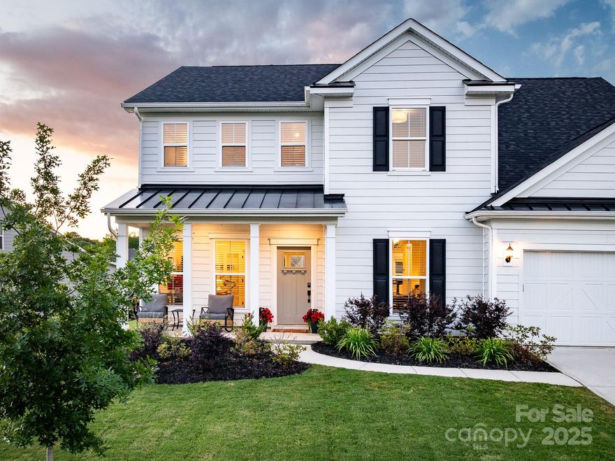 Stunning home in the gated neighborhood of Bretagne, 13 min. from The Bowl at Ballantyne, 15 min. from new Indian Land Costco & Lowe’s Foods shopping center & 30 min. from Uptown Charlotte. Beautifully designed & filled w/natural light, featuring a main floor office w/french doors, bright sunroom overlooking backyard, built-in drop zone area off the garage & a private bedroom w/ full bath, perfect for guests.  Kitchen features walk-in pantry, large island, gas cooking & stainless steel appliances. Open-concept kitchen & family room are ideal for entertaining, highlighted by custom built-in cabinetry surrounding the fireplace.   Upper-level includes loft w/large windows, a spacious primary suite w/luxurious soaking tub & his-and-hers walk-in closets & 3 add'l bedrooms, one w/private bathroom. Rear yard backs to common area space. Paver patio spans the full width of the rear of the home—perfect for relaxing or hosting gatherings. Neighborhood includes outdoor pool, cabana & play area.