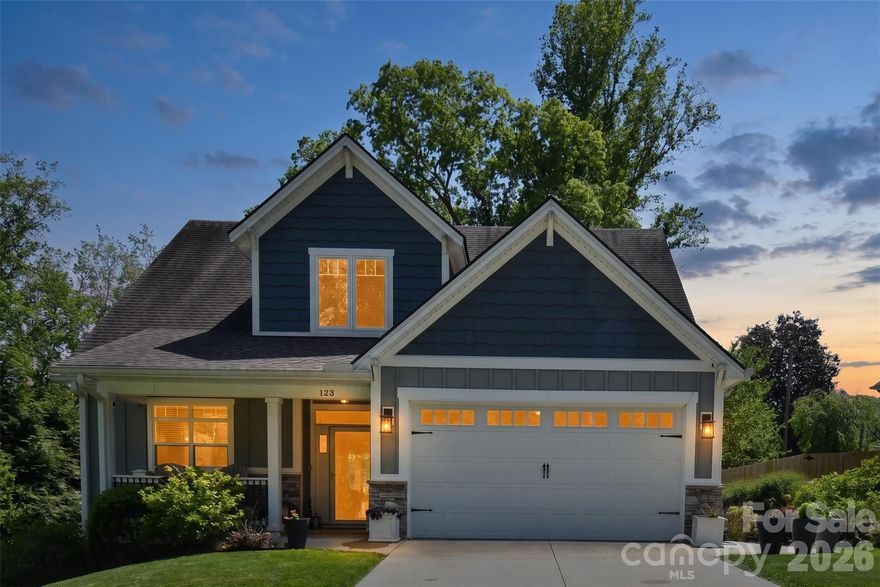 Welcome to this meticulously maintained 2016 home in Arden, where pride of ownership shines through every detail. This single-owner gem has been cherished and cared for since day one, offering the perfect blend of modern luxury and timeless comfort.
Step inside to discover gleaming wide-plank hardwood floors that flow throughout the open-concept living spaces, reflecting the abundant natural light from tall windows and soaring cathedral ceilings. The heart of the home is the beautiful kitchen, featuring elegant granite countertops, stainless steel appliances, and high-end finishes that make every meal a delight.
The thoughtful layout includes a spacious primary suite on the main level for easy living, with four generous guest bedrooms upstairs—ideal for family, visitors, or a home office setup. High-quality touches abound: spray foam insulation for exceptional energy efficiency and comfort, rock and granite accents, and a home that's generator-ready (generator does not convey).
Outside, prepare to be wowed by the landscaping that's truly to die for—a thick, lush lawn and mature plantings create a private oasis you'll love spending time in. The street itself offers that wonderful older-neighborhood charm, with its established feel and sense of community, while this newer cluster of well-built homes brings fresh, contemporary living into the mix. It's the best of both worlds in a welcoming, established setting.
Located in Arden, you're perfectly positioned to enjoy the vibrant energy of Asheville—with its acclaimed dining, arts scene, and attractions—just minutes away, all without the higher Asheville city taxes. Easy access to Biltmore Park Town Square, Lake Julian, the airport, and major highways makes everyday living a breeze while keeping you close to the action.
This is more than a house—it's a sweet, welcoming home ready for its next chapter of cherished memories. Don't miss the opportunity to make it yours!