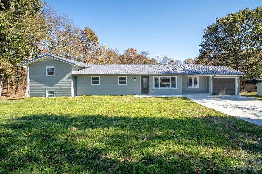 Beautifully updated 3 bedroom, 2 full bath home on 1 acre in North Iredell. The main level of the home features an updated kitchen with new cabinets, countertops, and appliances. Living room, bedrooms, baths, laundry are all located on the main level. New metal roof and HVAC.