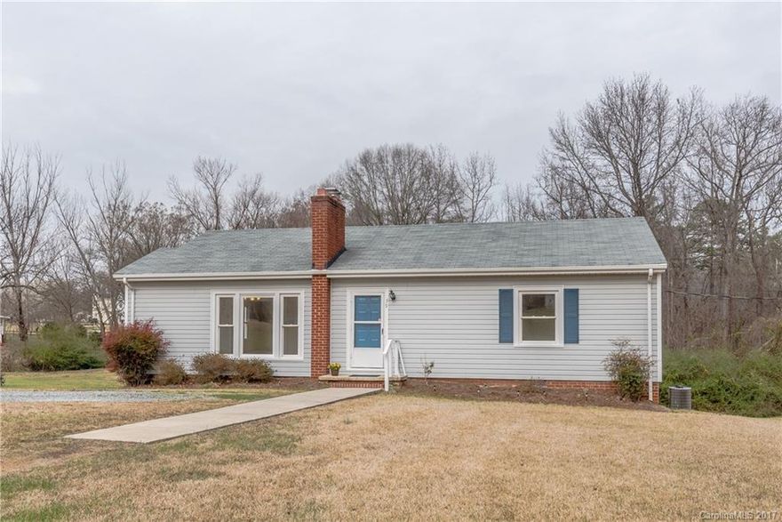 All new carpet, vinyl flooring, interior paint, kitchen sink & counters. Plus renovated bathroom, new vapor barrier, updated lighting, electrical, plumbing, & fixtures!  Tons of cabinets in a large kitchen! French doors lead to spacious dining room. Roof replaced in 2008.  Replacement windows, vinyl siding added w/ date unknown. Large second lot conveys with house, PID 5529-44-6632. 1-car garage downstairs w/ unfinished workshop area. Gas log fireplace in living room.