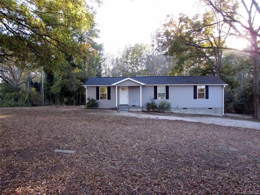 This one just has it. No muss, no fuss, just simple perfection with everything you need and nothing that you don't. Three bedrooms, two baths, and over an acre of land to call your own. A beautifully open kitchen complete with granite countertops and a large island work space and a cozy living area with gorgeous hard wood flooring. All this wrapped up on one level for easy living! So come check it out, stay a while, and imagine spending this winter in the present of all: your home sweet home!