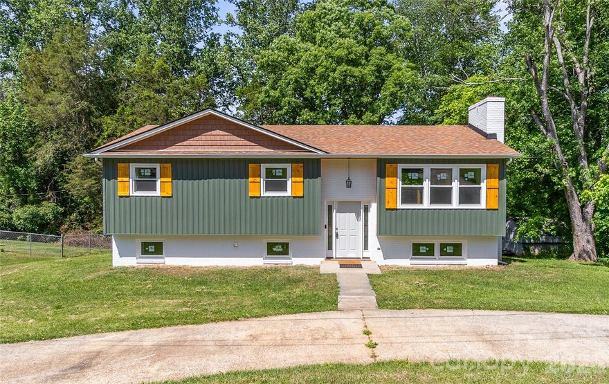 Completely remodeled and move-in ready, this 2,271 sq ft split-foyer home offers modern updates, functional space, and a peaceful backyard setting. Every major system and finish has been thoughtfully updated, allowing the next owner to enjoy the home with confidence and comfort.

The interior features brand new vinyl plank flooring throughout, new light fixtures, and large rooms that feel bright and welcoming. The kitchen has been fully renovated with new cabinets, new appliances, and modern finishes that make it both stylish and functional. The newly updated bathrooms offer a clean, contemporary feel ready for your personal touch.

The finished lower level with walk-out access, offers two bonus rooms that open the door to endless possibilities. Home office, gym, movie room, or hobby space, giving you the freedom to customize the home to fit your needs.

Major improvements include new siding, new windows, and a new HVAC system, along with two dedicated mini-split systems for the lower level, perfect for added comfort and efficiency. A brand-new deck off of the dining room extends the living space outdoors, ideal for relaxing or entertaining with a serene view.

Situated on a 0.35 acre lot, the backyard offers privacy and a natural setting with a creek running along the rear of the property. An additional 12x16 storage shed provides ample space for tools, equipment, or hobbies.

With extensive renovations already completed and a blend of indoor comfort and outdoor charm, this home is truly turn-key and ready for its next chapter.