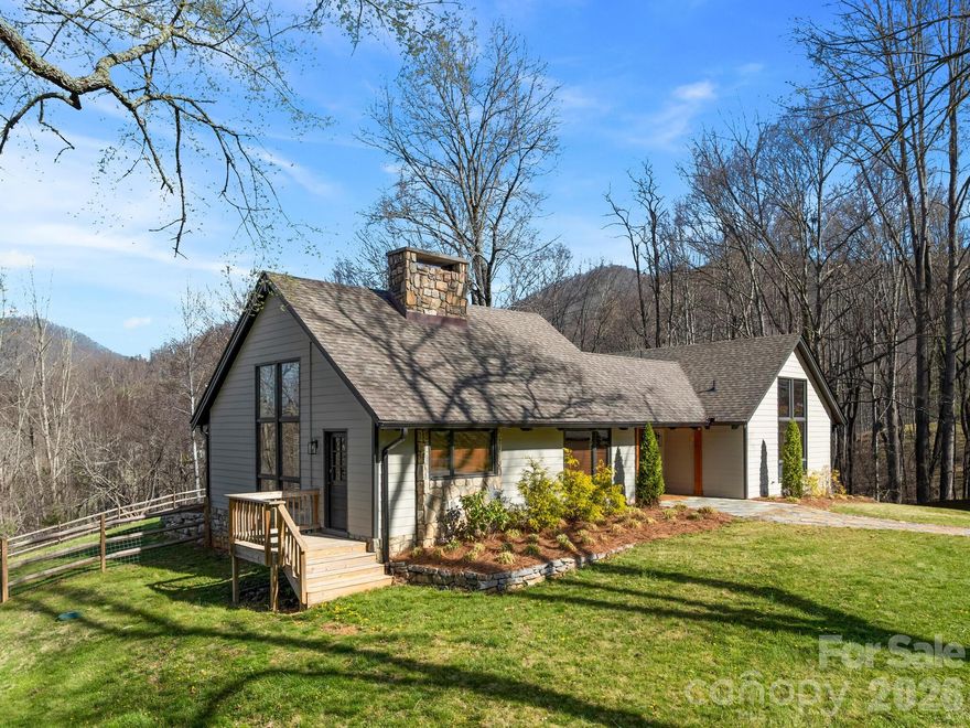 Sought After One Level Living in Springdale Resort!  
Nestled between Waynesville and the Blue Ridge Parkway, this updated home sits on an oversized corner lot offering mountain views with the convenience of Country Club living.  The home begins with a spacious stone foyer flowing smoothly into a great room featuring beamed ceilings, panoramic windows, large stone fireplace for 2-sided fires, and double sliding glass doors opening into the oversized screened in porch for outdoor living.  Galley kitchen has abundant cabinetry and is showcased with stone countertops and backsplash, while sharing it’s own fireplace with the lovely dining area.  The 3 bedrooms are all light and airy with cathedral wood ceilings and extra large windows.  Master bedroom ensuite has a truly beautiful bathroom with walk-in tiled shower and bench.  The main bathroom is complete with a tub/shower enclosure.  Springdale Resort facilities offer Rocky Face Tavern, fitness center, pool, hot tub and a Championship 18 hole golf course.
Surrounded by long-range mountain views, the community enjoys close proximity to the iconic Blue Ridge Parkway and the vast trail systems of Pisgah National Forest, offering endless opportunities for hiking, exploring, and enjoying the outdoors.  
Residents also benefit from seamless golf cart access throughout the resort, making it easy to reach pools, fitness facilities, and year-round dining.  With Asheville just a short drive away and every amenity close at hand, this home is where scenic living meets everyday convenience.