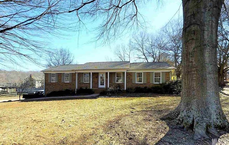 Great family home in the desirable neighborhood of Falling Creek. All brick 3BR/2Bath ranch with double garage in the basement. Nice open floor plan with plenty of space for everyone. Living room with extra space for office or study. The area being used for dining room has gas log fireplace and french doors for access to the 2 level deck out back. Laminate flooring in the main living areas, carpet in bedrooms and tile in the bathrooms. Large bedrooms with good closet space, including walk in closet in the master bedroom. Updated HVAC and roof in 2013. Large kitchen with plenty of counter space and a breakfast nook, too.   Laundry room currently in basement, but if preferred, there is laundry hookup available in the hall bathroom upstairs in the closet. Call today for your showing appointment.