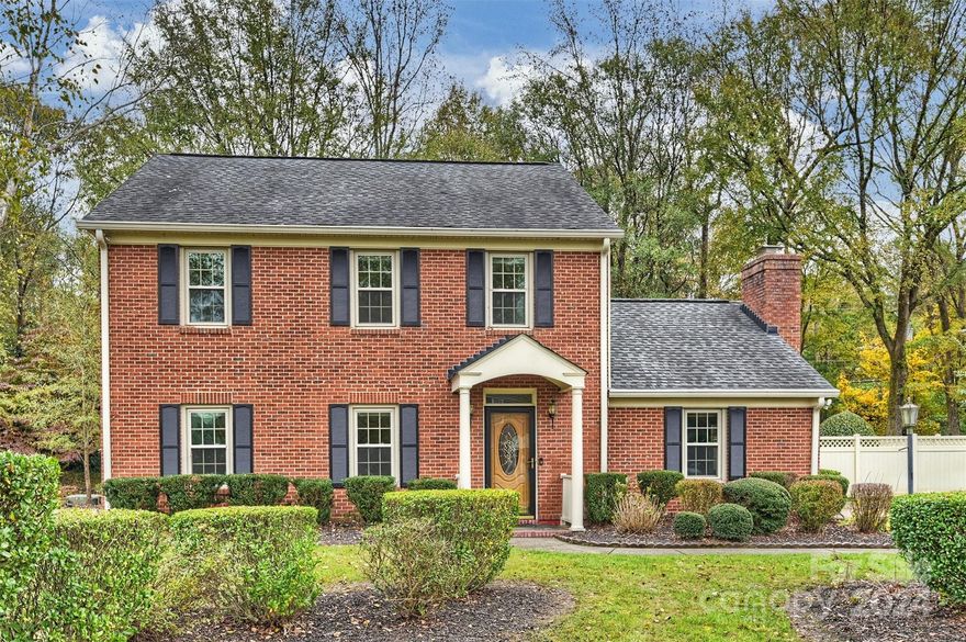 Gorgeous full brick home on a private, scenic lot in the heart of Ballantyne!  Featuring wood floors on the main level and upstairs hallway, this stunning home offers a large, eat-in kitchen with scenic backyard views, den with vaulted ceiling and fireplace, a formal dining room, and an expansive living room.  Three spacious bedrooms on the upper level, primary suite with large, walk-in closet, and primary bath with dual vanities and water closet. Bedroom 2 features an ensuite bath with walk in shower!  The rear yard has a six foot privacy fence, an outdoor storage closet and shed, irrigation system, and an expansive deck for outdoor enjoyment.  

Newer triple pane windows and gutters with gutter guards.  

Situated between a cul-de-sac and the observation deck to the 12-acre HOA owned pond and property, enjoy scenic beauty from all angles of this beautiful community. Walk to Trader Joe's and the greenway!  A short distance to I-485 and all of the shopping and dining in Ballantyne!