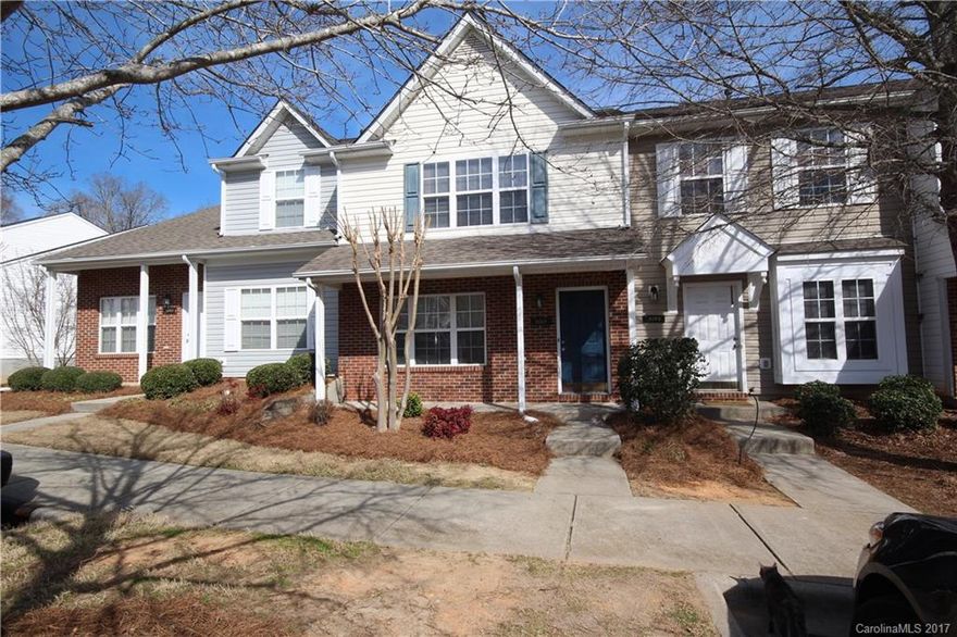 Ready to move in!Pristine townhome boasts a spacious living/dining area w/attractive wood laminate flooring, corner fireplace, triple windows that make it light & bright. Eat-in Kitchen has good cabinet/counter space, center island, cremate tile, separate laundry room. Two vaulted Masters bedrooms suites up, each w/private bathrooms & walk in closets. Deck backs up to woods, great for entertaining. Community pool.Easy access to Ballantyne area w/shopping, dining. Low SC taxes!