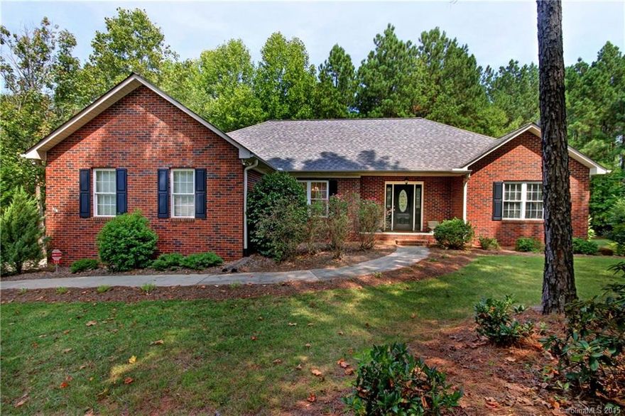 Beautiful home on large wooded corner lot in highly desirable Wildlife Bay Subdivision. Hardwood floors, solid surface countertops, walk in closets in all bedrooms. Basement offers a large playroom, full bath & workshop. Neighborhood has a walking trail that leads to the lakeside.