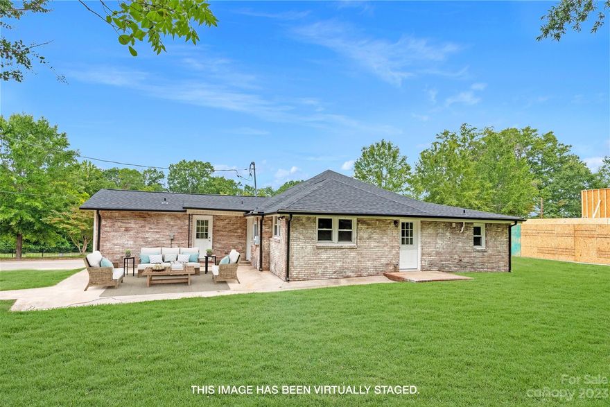 Brick Ranch home 1680 sq. ft. completely renovated  3 – 4 bedrooms with double master, 3 full baths and options galore.  A living area with private entrance and full bath, yet accessible to the main house.  Ideal as a mother-in-law suite, a child wanting privacy, or even a rental.  All new:  kitchen cabinets with granite and butcher block, bathroom vanities and tubs, appliances, luxury vinyl plank floors throughout, HVAC, Electric, water heater, plumbing, roof.  Beautiful, stained beams in the kitchen dining area.  This is a must see!