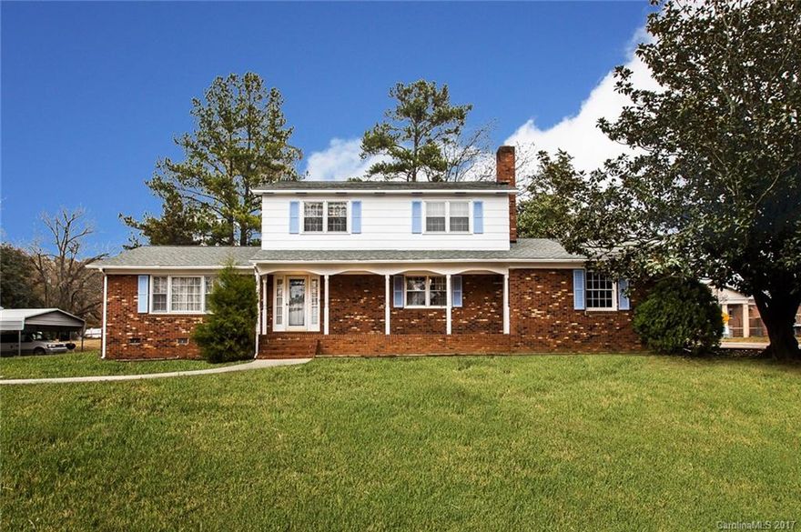 Great location in Lancaster. Large 4Bed/3 Ba home with Master down floor plan and second master upstairs. New flooring in kitchen, carpet areas and bathrooms.  Just installed not reflected in these photos.  Front porch and screened back porch. Formal dining and living rooms, and family room with fireplace and built-ins.  This home has a large yard in front and back and large mature trees. Convenient to school and restaurants.