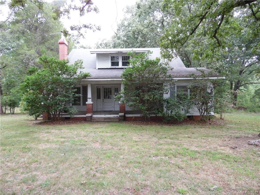 Arts and Crafts style home situated on 1 acre in Albemarle. Property is zoned Commercial (RO). Last used for Photography Studio. Selling AS IS.