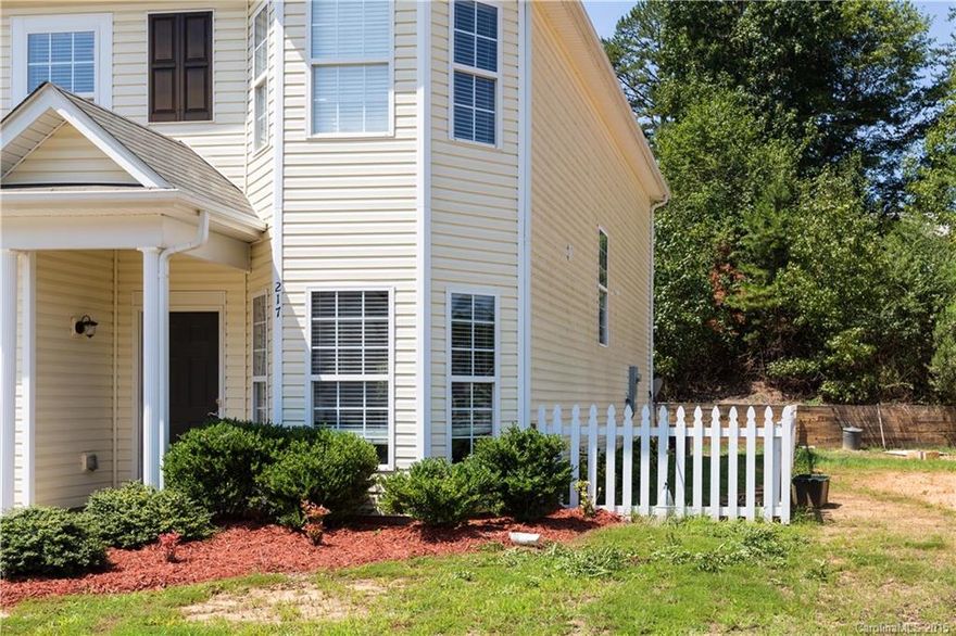 Multiple offers-submit by noon 9/1/15 End unit, fenced yard, single car finished garage with opener, stainless steel appliances, new laminate flooring on main AND space to the side and rear of your home!!! Kitchen w/breakfast nook opens to living area. Dining area at front of home currently used as a reading area. Large secondary bedrooms and a very large master suite.  This town home is over 1750+ square feet-lots of space for the money! This home sits just before the cul-de-sac.