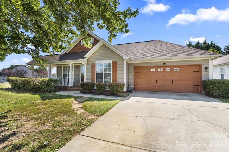 This home is waiting for new owner with open floorplan in a great location.  Large wrap around front porch on corner lot.  Backyard has large patio with wood fencing that offers lots of privacy.  Just minutes away from Concord Mills, restaurants, and 85.  There are a lot of unique features in this home such as arched doorway and squared columns.  Floorplan is great for entertaining.  Master suite is on the main level with remodeled updated Master bath.  House has very unique features.  Wide staircase leads up to second level where you will find an additional third bedroom, which is ideal for overnight guest.  There is a sliding glass door that leads out to a separate balcony  area.  This room can also be used for theatre or recreation space.