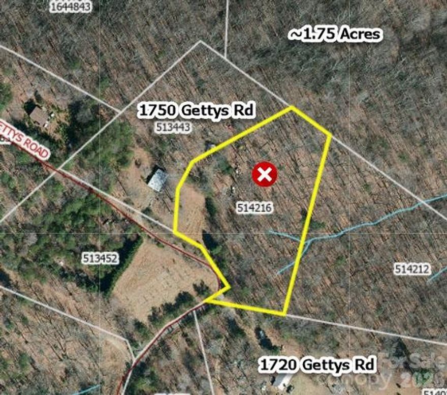 1.75 acres of privacy 3 miles off of Hollis Road. When the paved portion of Gettys Road ends, the dirt road begins leading you to your private oasis. There may be part of a stream on the property but unable to confirm. Build your dream home nestled in the trees where you can enjoy the beauty of the fall colors and the feeling of being away from busy life while still being just close enough to what you need. No restrictions and no city taxes. The front part of Gettys Road is state maintained but this property is approximately 1 mile after the road maintenance ends and the dirt road begins.
