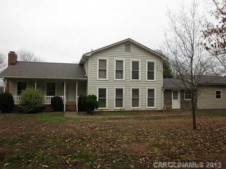Home Warranty. Private 6.77 Acre Horse Ranch near Charlotte. 4 stall cinder block built/steel barn. Barn has a tack room, laundry area w/ shower, reinforced hay loft, inside lunging ring, high amp voltage, RV parking, and new metal roof. Cleared pastures right outside of the barn. Your new home has a Patio off of MBR, updated kitchen, and an updated lower level bathroom. Huge bonus room Lower Lvl.