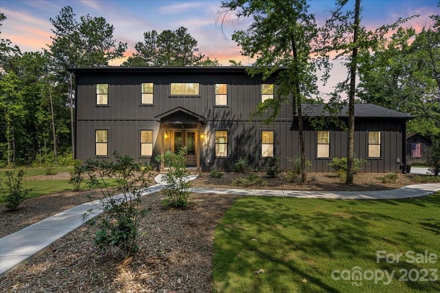 Welcome home to this one year young custom built home in Van Wyck. This home boasts 4 bedrooms, 3 and 1half baths with separate office space as well as a playroom/bonus space upstairs. Upon entering, you will love the open floorpan with 10 foot ceilings all through out the main floor. Commercial oven in the kitchen with marble backsplash is the kitchen of your dreams. Tucked behind the kitchen is a pantry stocked full of cabinets and storage. On the main floor there is a secret office, half bath, drop zone, dining room, primary room and bath as well as a massive screened in porch with double sided fireplaces.When you arrive upstairs, you will see a huge playroom that kids can enjoy as well as 3 more bedrooms. Two rooms share a J&J Bath, while the other bedroom has its own en-suit.Each bedroom has its own walk-in closet. Lastly, upstairs there is an oversized laundry room with additional storage and attic access. Sitting on over 2 acres of land zone for Indian Land school district.