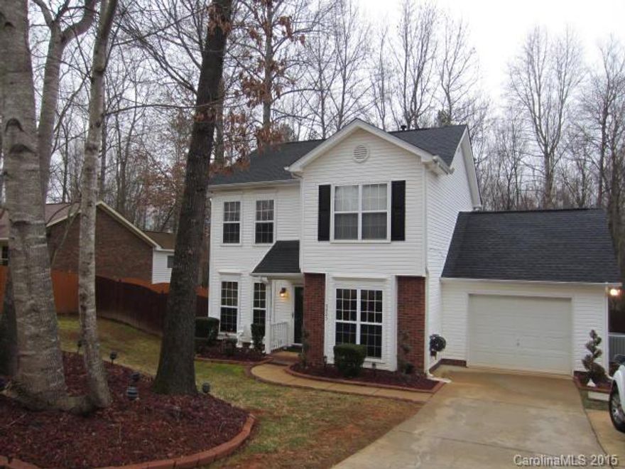 Picture Perfect 2 Story Home!  3 Bedrooms/2.5 Baths.  Great location - Cabarrus School District. Hardwood & tile flooring, trey ceiling & custom crown mouldings, FP in Living room, Breakfast nook, Tiled kitchen countertop, blinds, refrigerator & stove included, Ceiling fans w/ remotes, New roof 2012, 2009 Trane HVAC, Tankless water heater, Master bedroom w/ walk-in closet, Wired Workshop w/ shelving, custom landscaping & lighting, Fenced in yard & large deck.  Well-maintained & ready to move in!