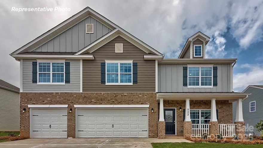 3 Car Garage and main floor guest suite! Wow! New Community just 1.5 miles from downtown Troutman and Troutman schools! Upon entrance is an open living & dining area. Family room features a gas log fireplace with decorative mantle. Spacious kitchen includes Gas stove, Quartz counters & tons of storage and workspace including pantry, island and a built-in work desk/breakfast bar! Guest bed with on-suite is a highlight of this home. Rear staircase leads to a HUGE bonus room with 3 large secondary beds, all with walk-in closets. Bedroom 2 has a private full bath. Primary bathroom features a 5 ft shower with glass door, luxury garden tub, double vanities, separate water closet and large walk-in closet. Beautiful upgrades included such as 2" faux wood blinds, vinyl wood plank on first floor, wrought iron spindles and sleek LED lighting. Smart Home package included.  Closing Cost Incentive Available w/ Preferred Lender. Convenient to 77, Mooresville and Lake Norman State Park!